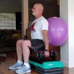 resistance exercises for older adults - ball squat with dumbbells