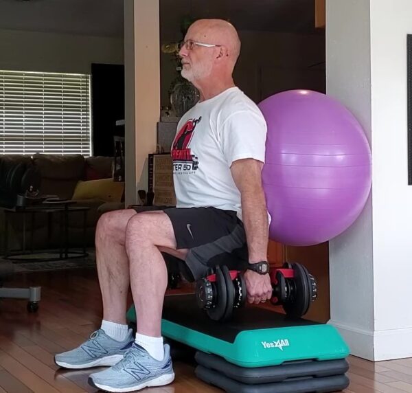 resistance exercises for older adults - ball squat with dumbbells